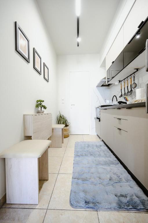 A kitchen or kitchenette at Central Apartments City Center