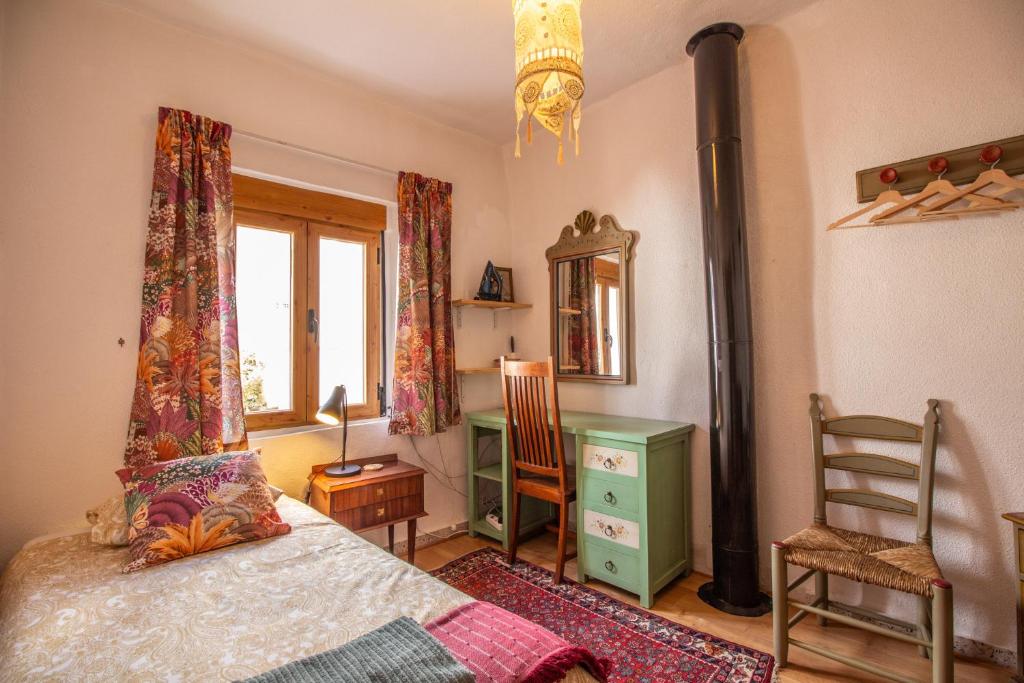 Łóżko lub łóżka w pokoju w obiekcie Casa El Sarük