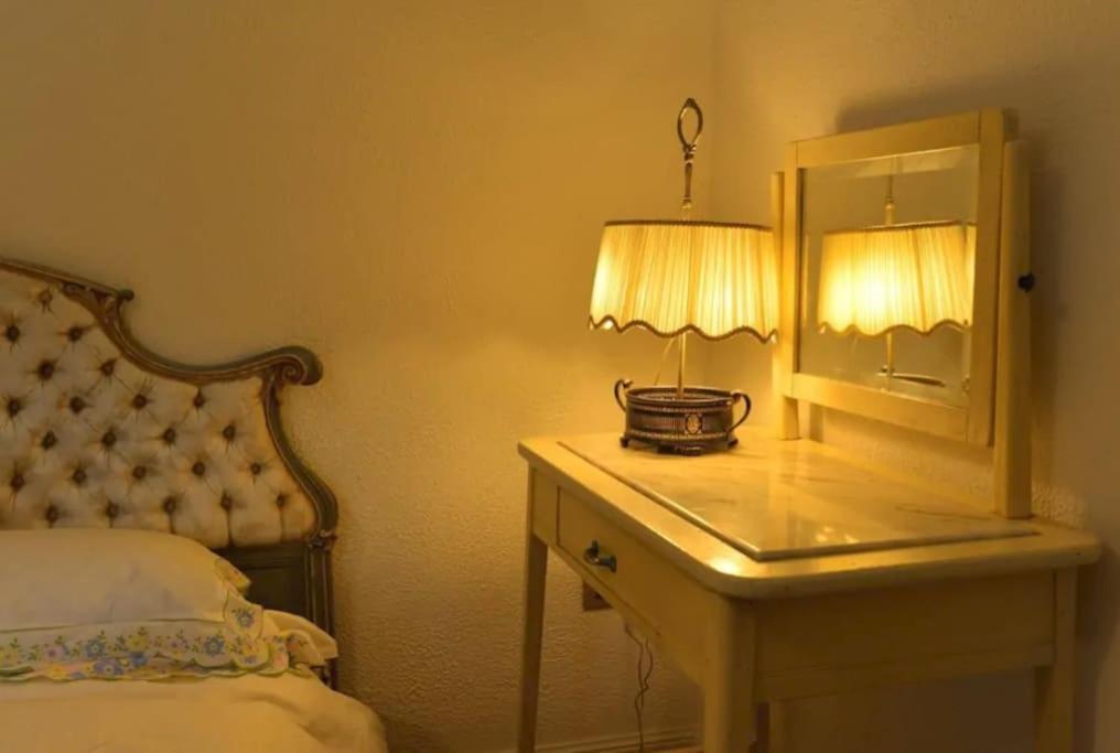 Postel nebo postele na pokoji v ubytování Antico Chalet Momosa Maxi