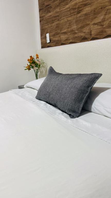 Postel nebo postele na pokoji v ubytování Kromatic Hostel