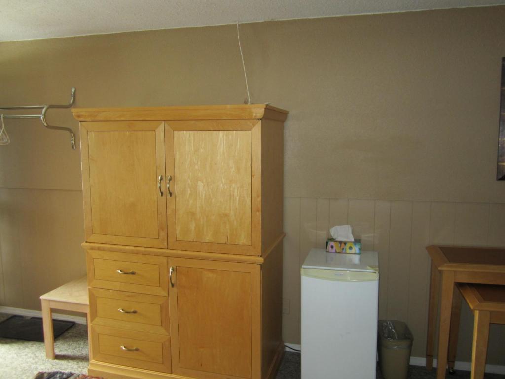 Kuchyň nebo kuchyňský kout v ubytování Bulkley Valley Motel