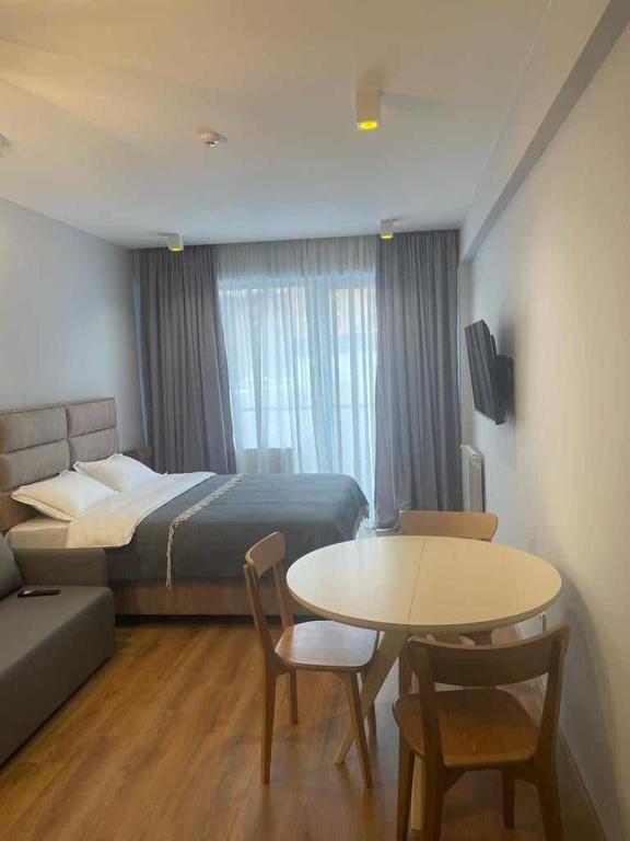 Postel nebo postele na pokoji v ubytování new gudauri redko apartment twins