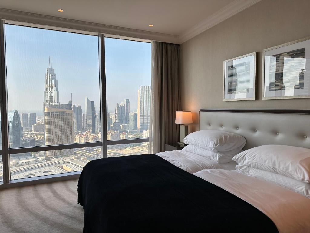 Postel nebo postele na pokoji v ubytování Stunning Burj View