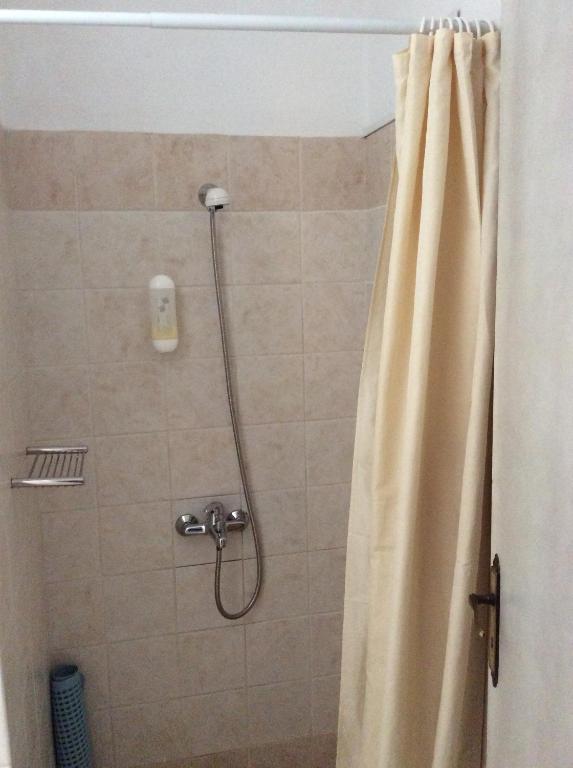 Koupelna v ubytování Rozos Hotel