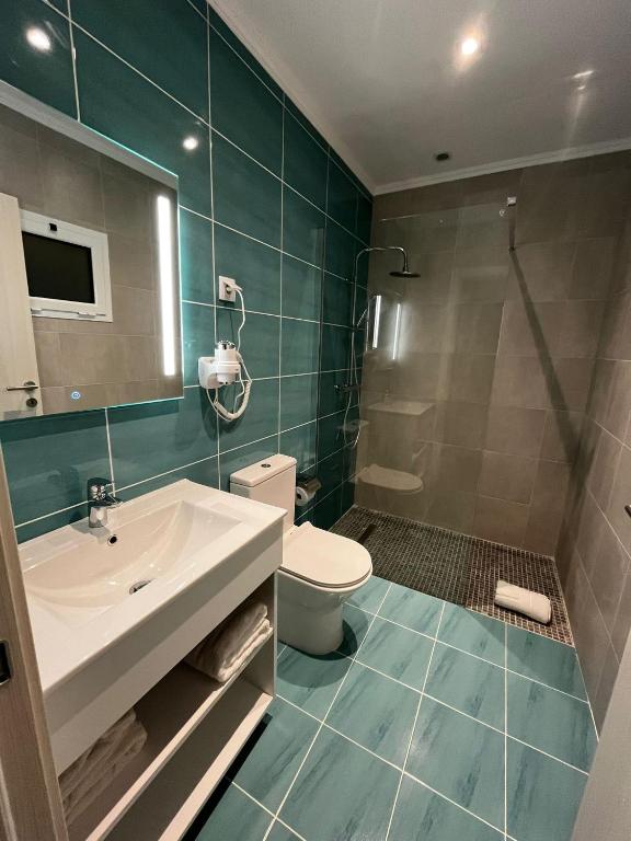 Koupelna v ubytování Alojamento Local Monte Horeb