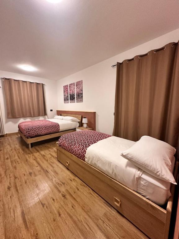 Postel nebo postele na pokoji v ubytování C’era una volta un Re…