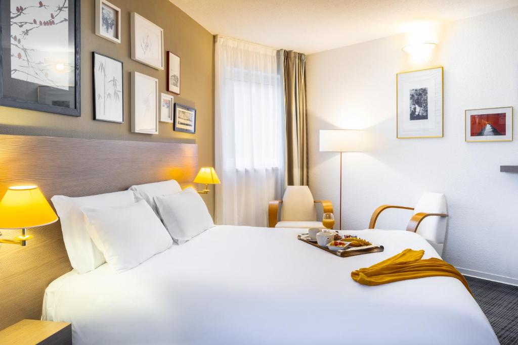 Postel nebo postele na pokoji v ubytování Mercure Hotel Forbach Centre de Loisirs