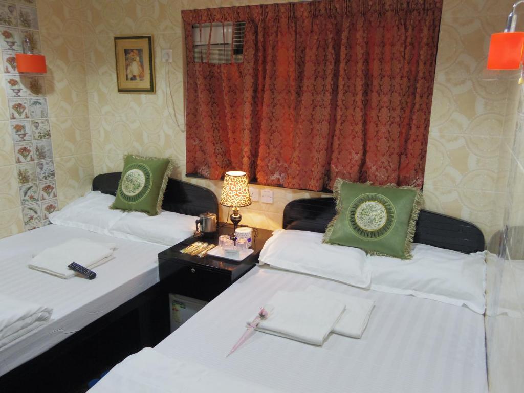 Voodi või voodid majutusasutuse Mabuhay Hotel toas