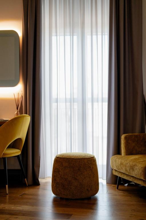 Posezení v ubytování Lo Stemma Luxury Boutique Hotel