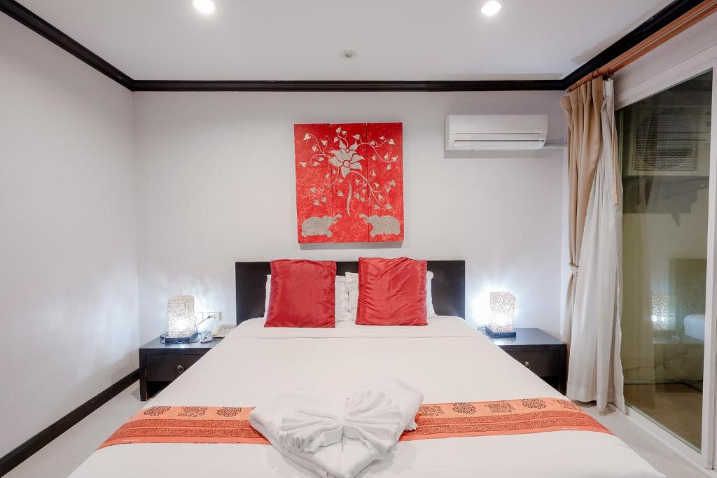 Postel nebo postele na pokoji v ubytování Napalai Resort Hua Hin