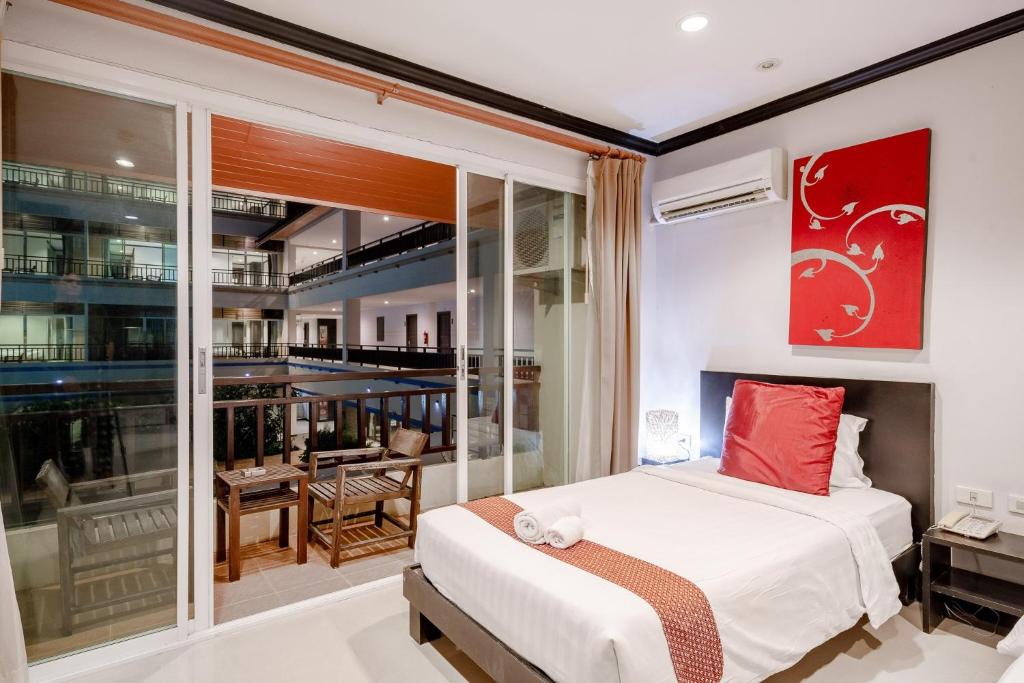 Postel nebo postele na pokoji v ubytování Napalai Resort Hua Hin