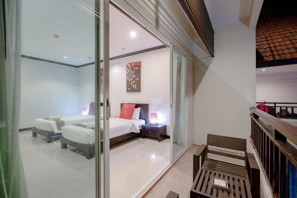 Postel nebo postele na pokoji v ubytování Napalai Resort Hua Hin