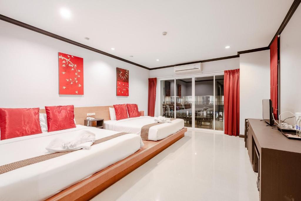 Postel nebo postele na pokoji v ubytování Napalai Resort Hua Hin