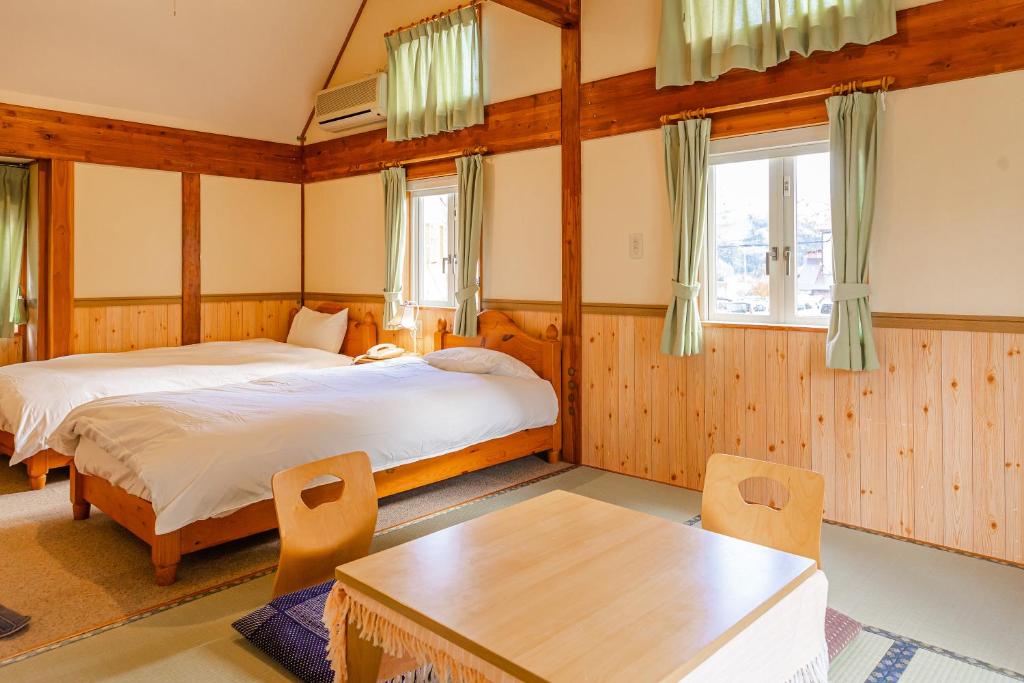 Postel nebo postele na pokoji v ubytování Funny Inn
