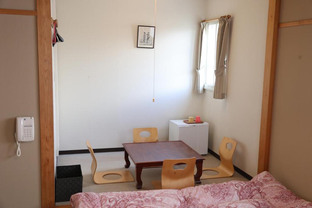 Postel nebo postele na pokoji v ubytování Funny Inn