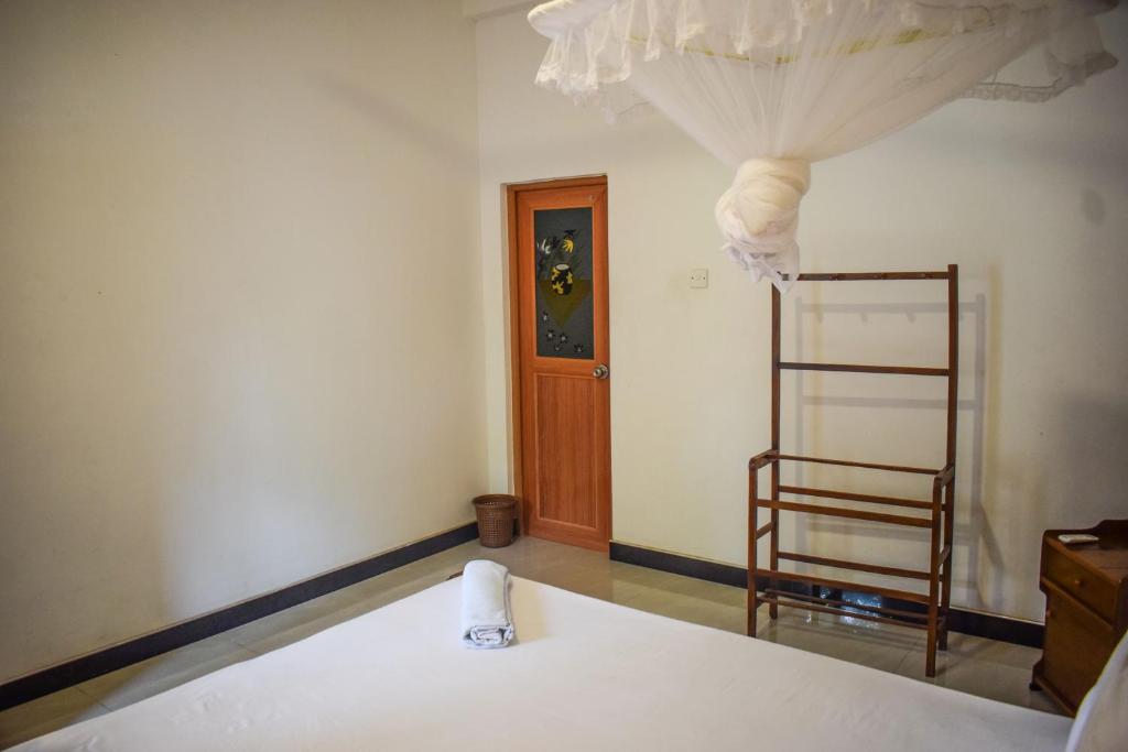 Postel nebo postele na pokoji v ubytování Sea Zone Resort