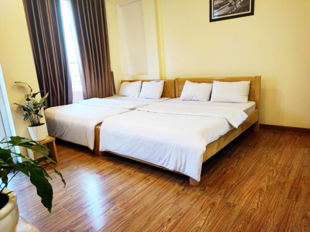 Postel nebo postele na pokoji v ubytování Thảo Nguyên