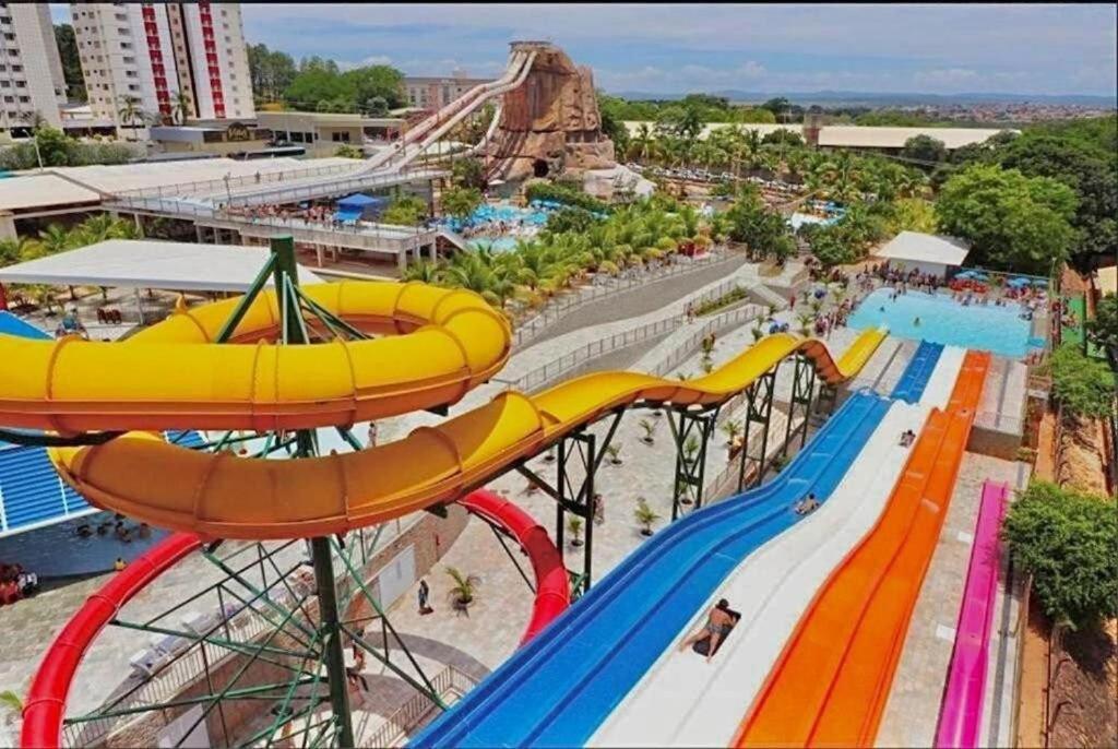 an amusement park with a roller coaster and a water park at Spazzio diRoma Com Parque Acqua Park Splash Incluso in Caldas Novas