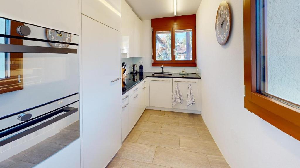 Kuchyň nebo kuchyňský kout v ubytování Family holiday home Tgiampi Sot Lantsch Lenzerheide