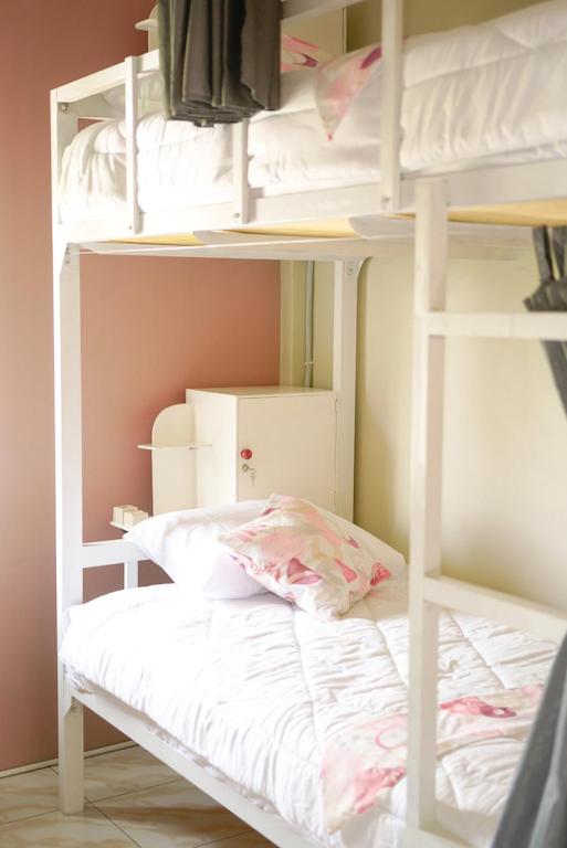 Postel nebo postele na pokoji v ubytování Bajo Bunkhouse