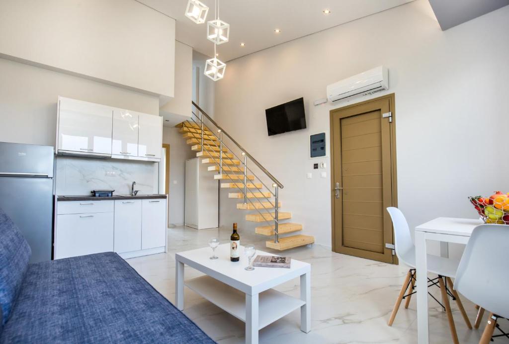 Η κουζίνα ή μικρή κουζίνα στο Aria suites