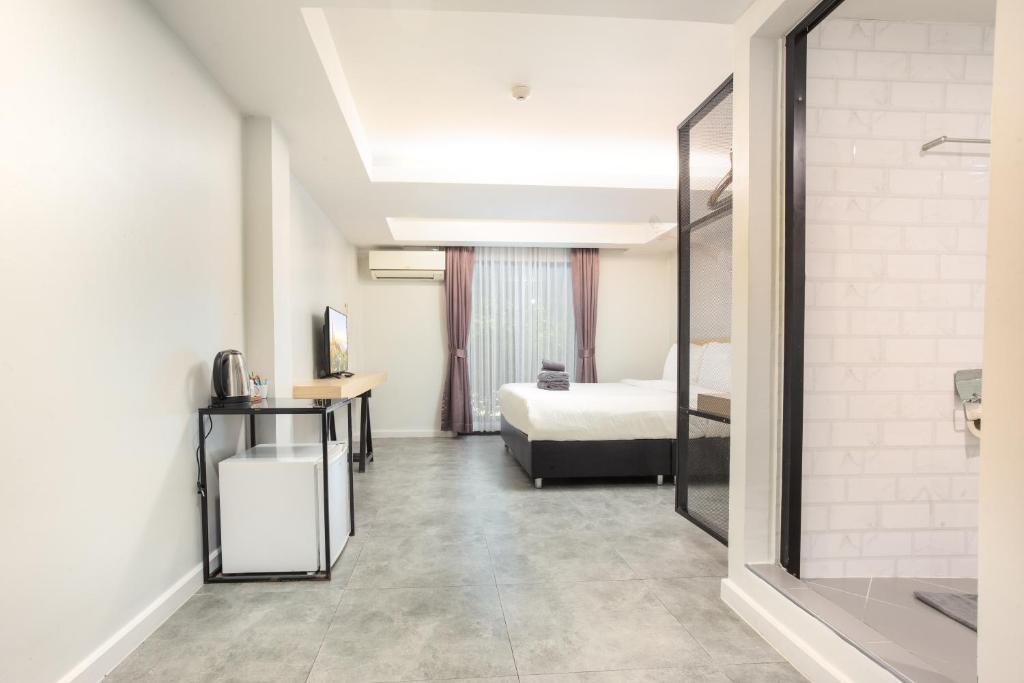 Postel nebo postele na pokoji v ubytování ISTY Design Hotel
