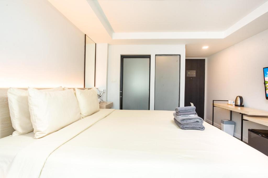 Postel nebo postele na pokoji v ubytování ISTY Design Hotel