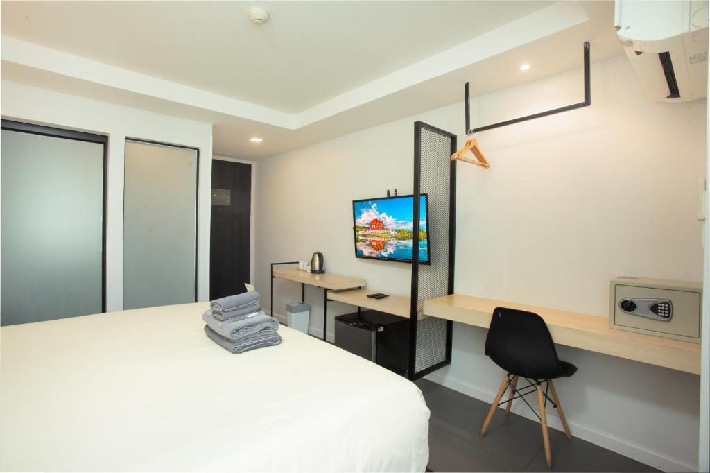 Postel nebo postele na pokoji v ubytování ISTY Design Hotel