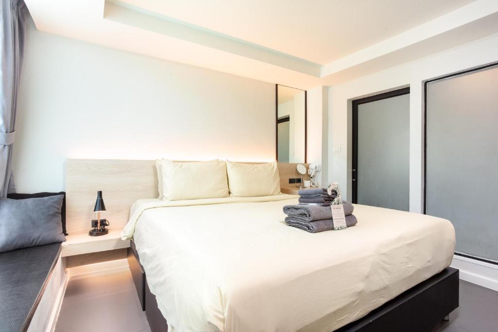 Postel nebo postele na pokoji v ubytování ISTY Design Hotel