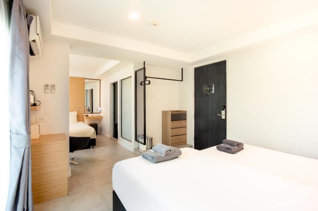 Postel nebo postele na pokoji v ubytování ISTY Design Hotel
