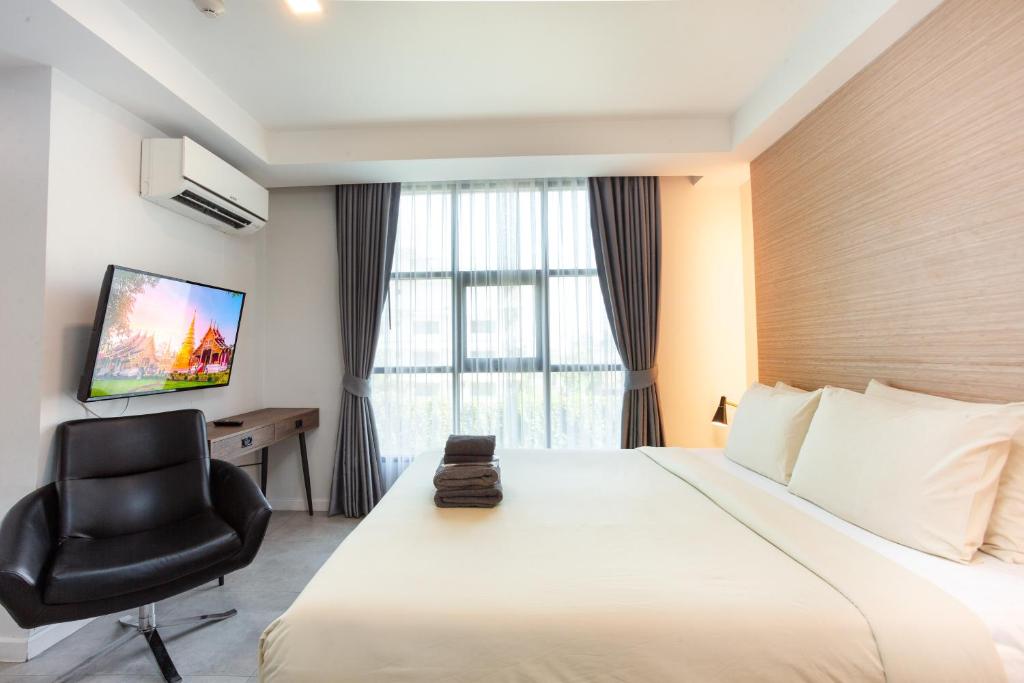 TV a/nebo společenská místnost v ubytování ISTY Design Hotel