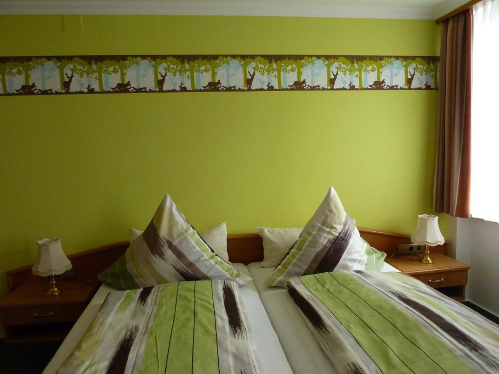 Postel nebo postele na pokoji v ubytování Gasthaus zum Schwanen