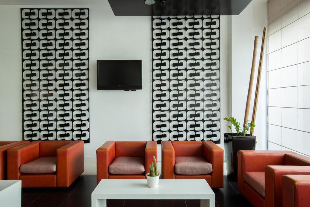 TV a/nebo společenská místnost v ubytování Euro Hotel Residence