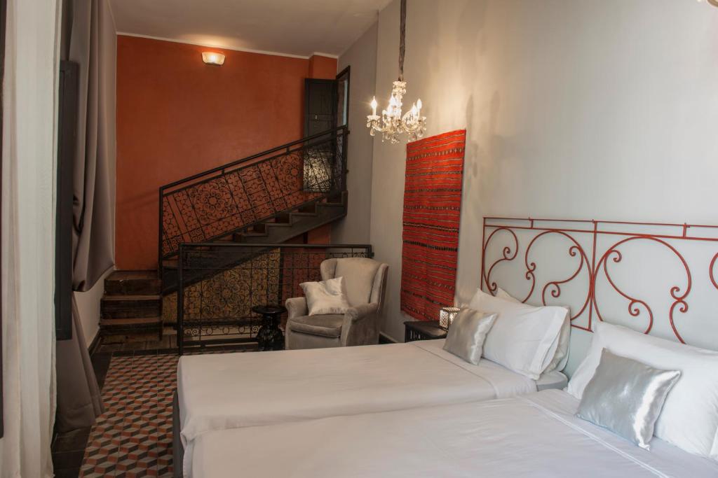 Postel nebo postele na pokoji v ubytování Riad Palais Bahia Fes