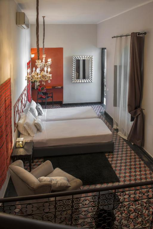 Postel nebo postele na pokoji v ubytování Riad Palais Bahia Fes