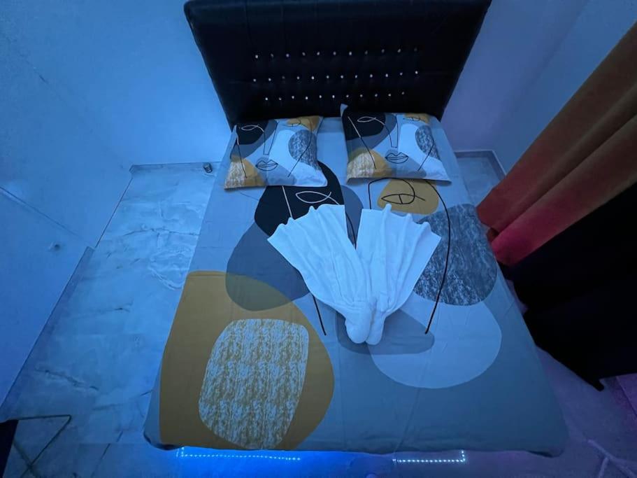 Postel nebo postele na pokoji v ubytování Golden seconds