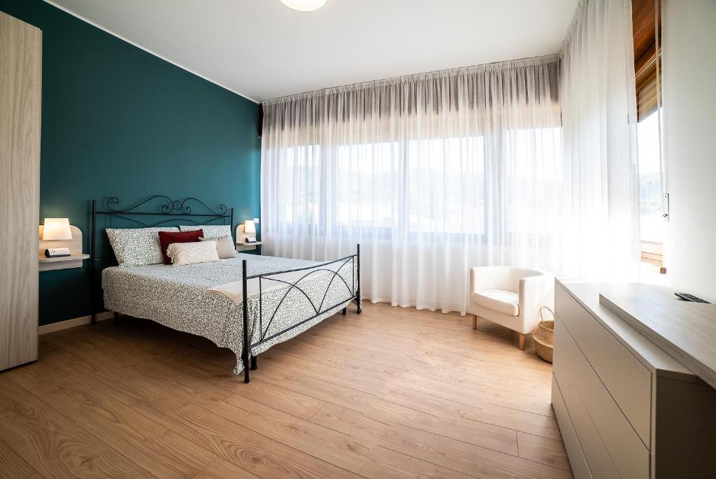 Postel nebo postele na pokoji v ubytování b&b All'Angelo
