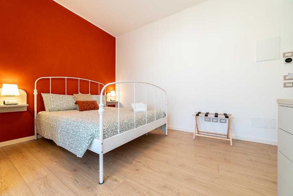 Postel nebo postele na pokoji v ubytování b&b All'Angelo