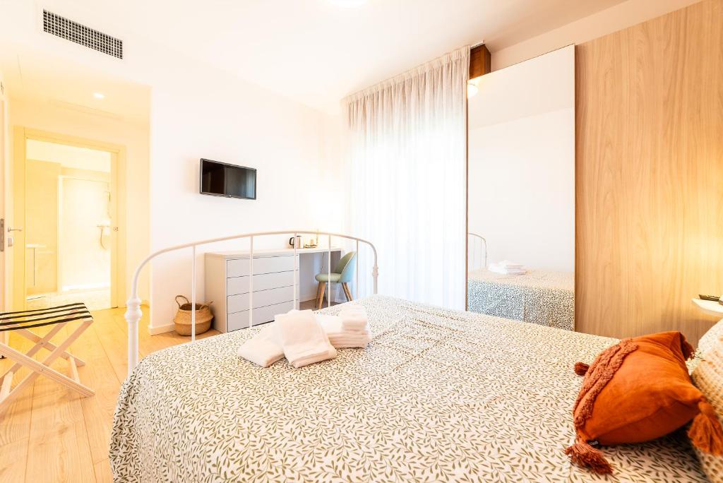 Postel nebo postele na pokoji v ubytování b&b All'Angelo