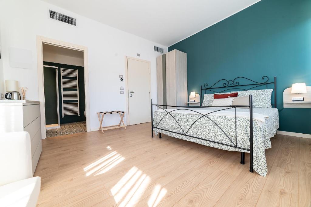 Postel nebo postele na pokoji v ubytování b&b All'Angelo
