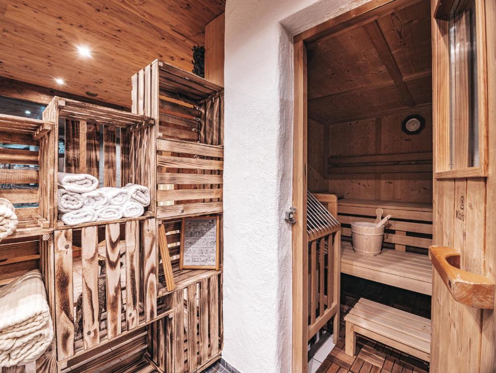 Postel nebo postele na pokoji v ubytování Hotel Mitterhof
