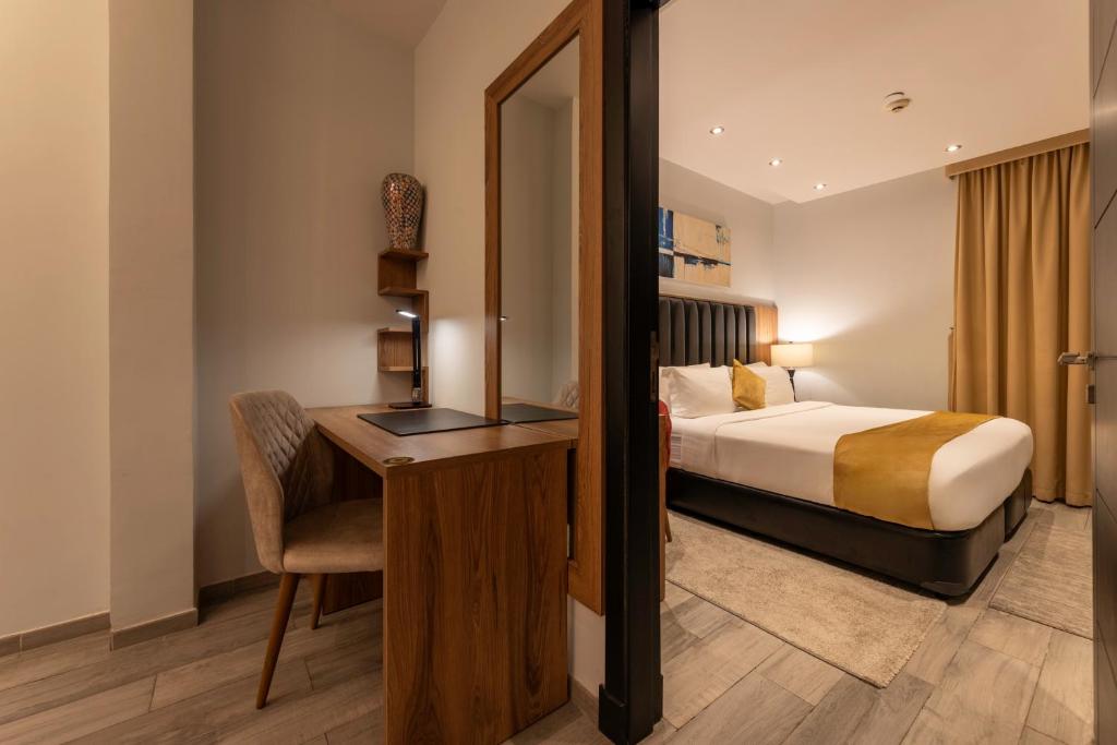 Postel nebo postele na pokoji v ubytování Andalus Habitat Hotel