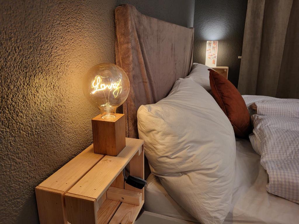 Postel nebo postele na pokoji v ubytování Ski-in cosy studio
