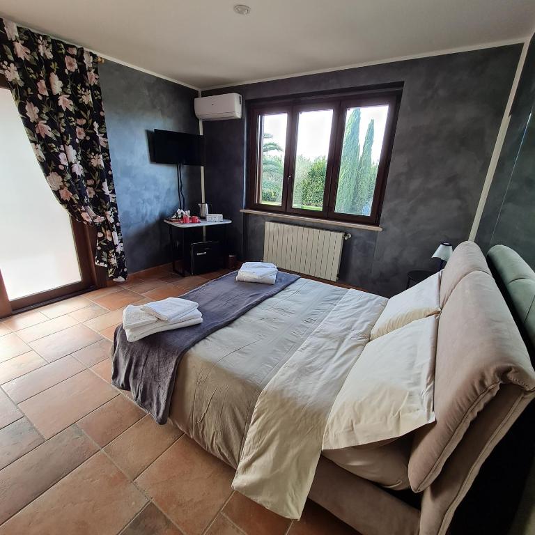 Postel nebo postele na pokoji v ubytování Selva Castalda