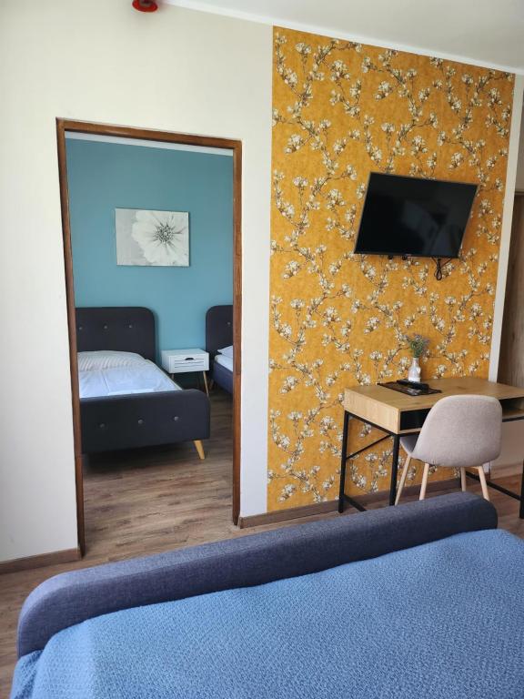 Postel nebo postele na pokoji v ubytování Főnix Badacsony