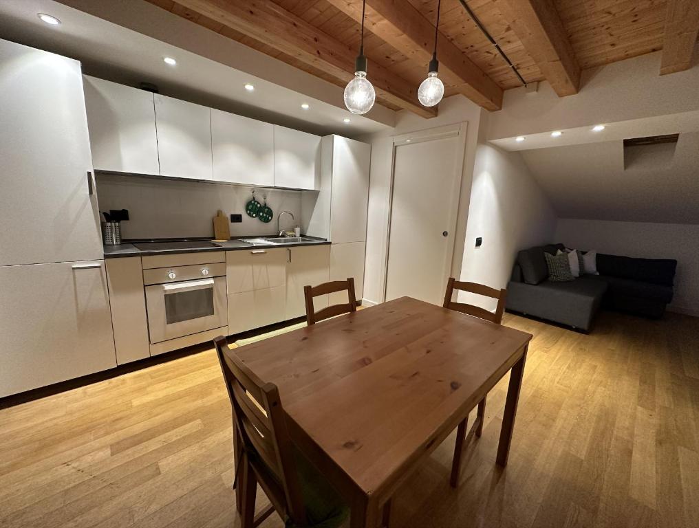 Ett kök eller pentry på PM 26 Via Riccardo Morbelli Guest House