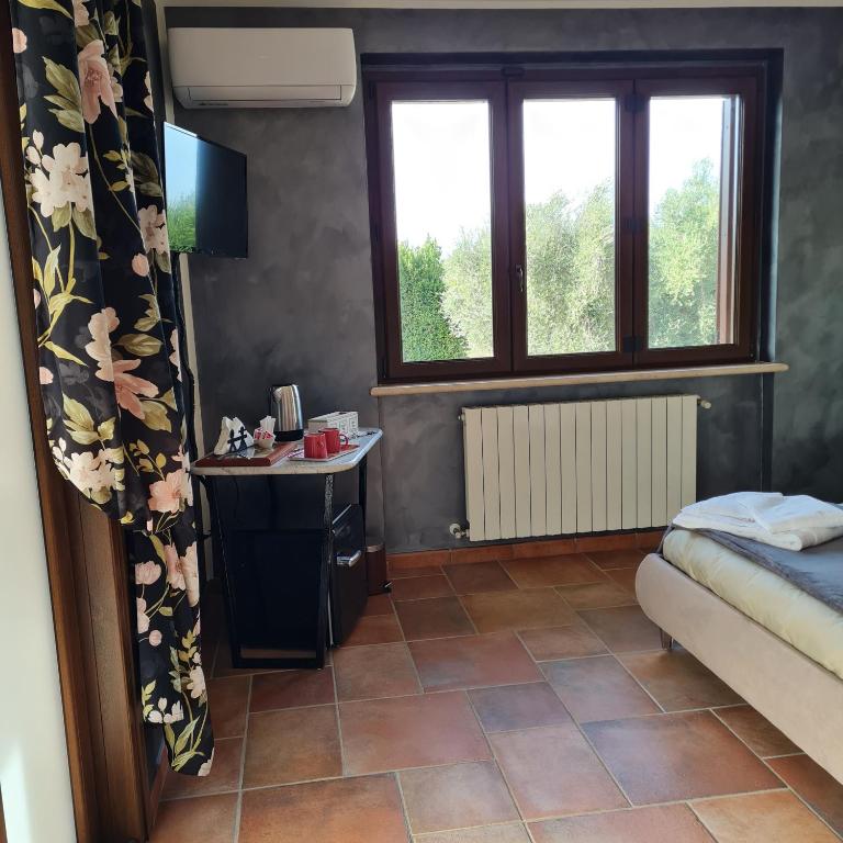 Postel nebo postele na pokoji v ubytování Selva Castalda