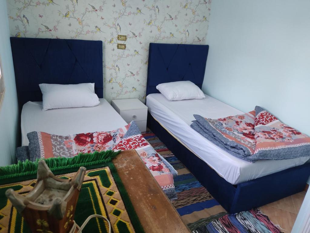 Postel nebo postele na pokoji v ubytování Elkhaima motel