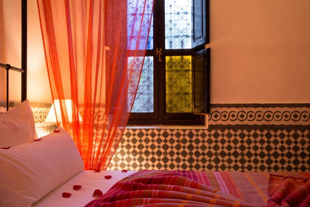 Postel nebo postele na pokoji v ubytování Origin Hotels Riad Lhena