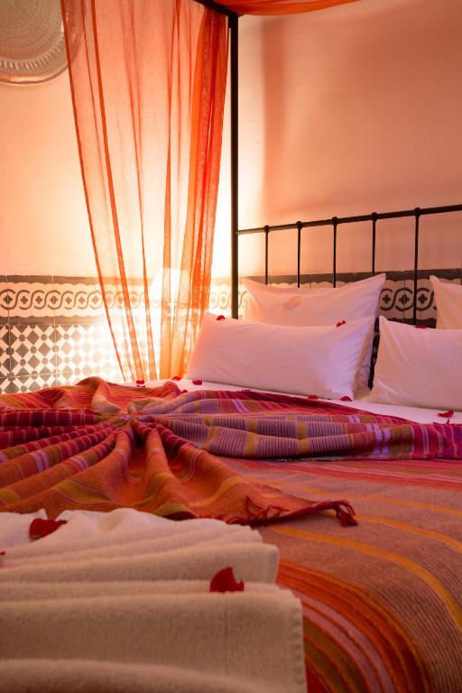 Postel nebo postele na pokoji v ubytování Origin Hotels Riad Lhena